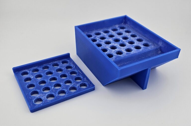 On the left is the cap holder, but in addition to holding the caps in place for capsule assembly, it serves a secondary purpose while filling the capsule bodies